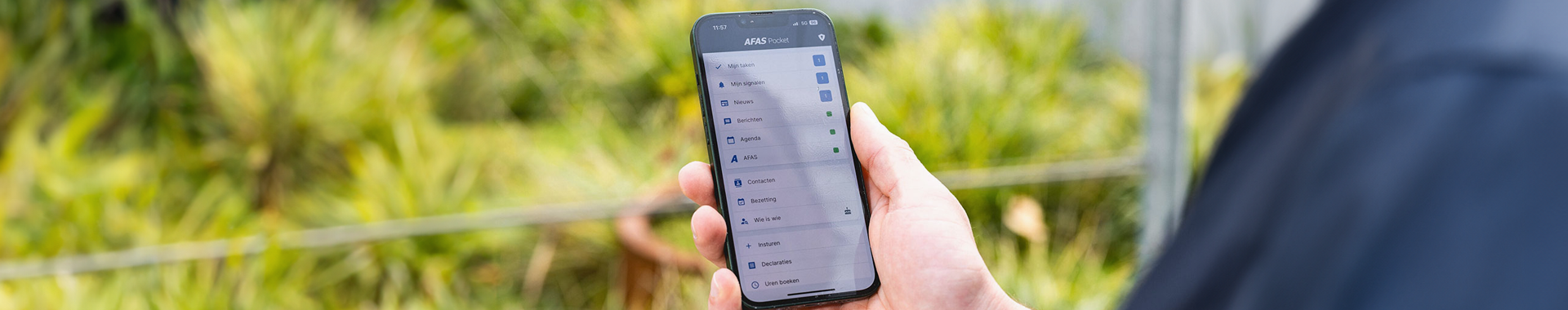 Afas pocketapp wordt getoond op een mobiele telefoon.